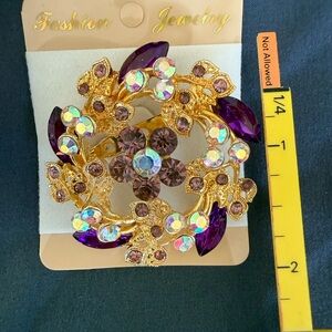 The Aurora Gold tone Purple Crystals Blossom Brooch